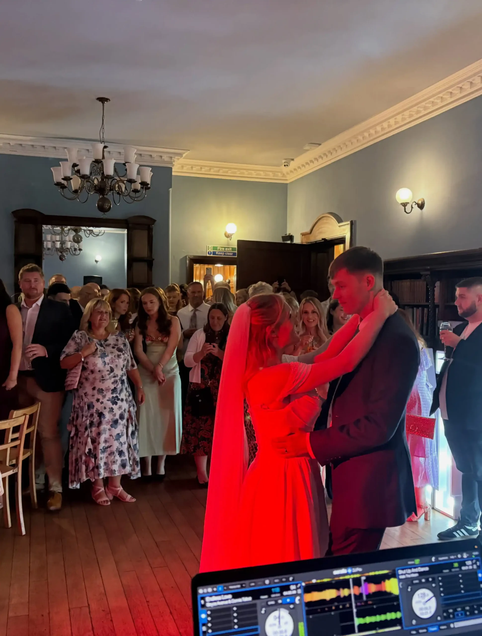 bride and groom dancing to DJ
